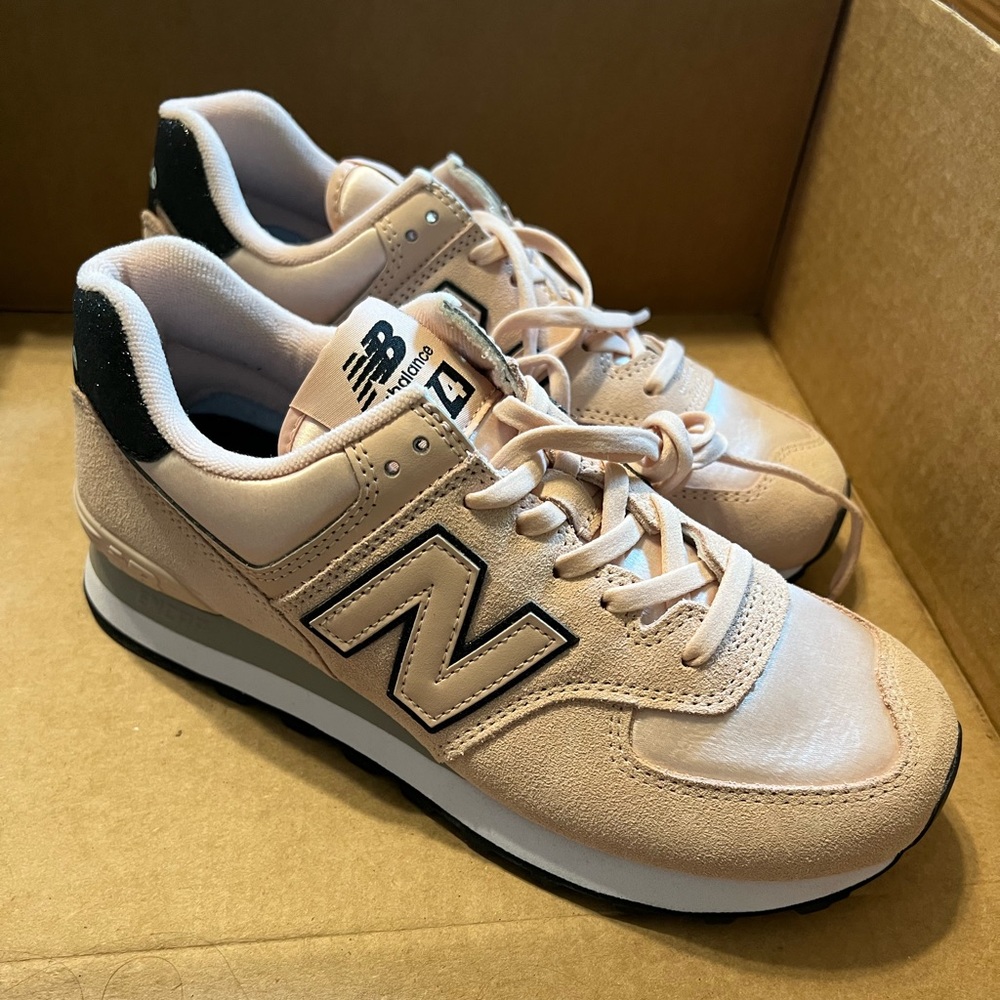 Pink and black new balances